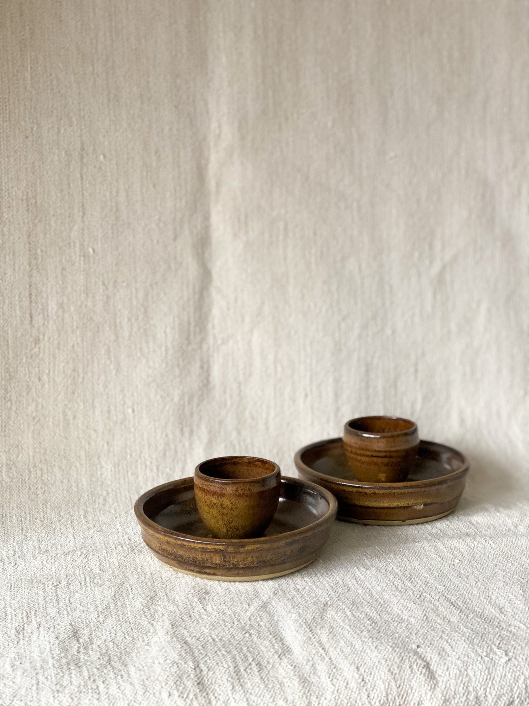 VINTAGE POTTERY EGG CUP HOLDERS